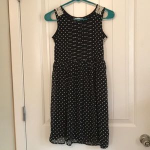 Black polka dot dress for girls with a lace back